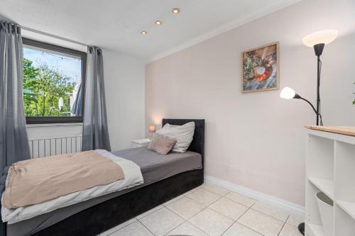 Katil atau katil-katil dalam bilik di Modern House "Brick Lane" with Terrace and Wintergarden - LOFTIGO