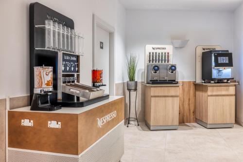 Η κουζίνα ή μικρή κουζίνα στο Ohtels Gran Hotel Almeria