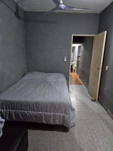 Postel nebo postele na pokoji v ubytování Temporarios Caseros SDE 1D PB