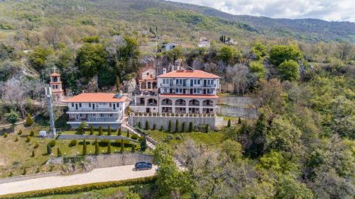 an aerial view of a large house in the mountains at Konaci Manastir Sveti Stefan - Ohrid in Ohrid