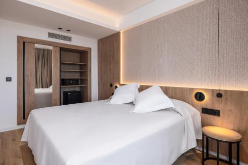 Ένα ή περισσότερα κρεβάτια σε δωμάτιο στο Ohtels Gran Hotel Almeria