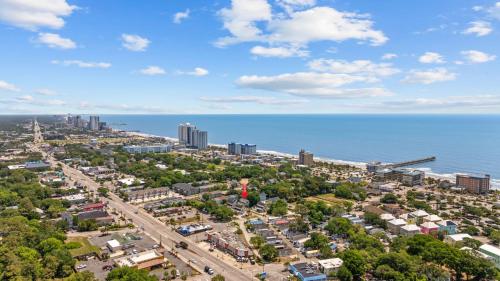 an aerial view of a city and the ocean at Beach Vibes Villa - 3 Bedrooms in prime location near beach with private yard! in Myrtle Beach