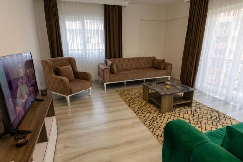Televisyen dan/atau pusat hiburan di Belya Apart Hotel
