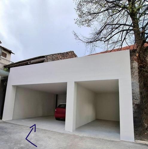 a garage with a car parked under it at Apartment Carmen in Lasa