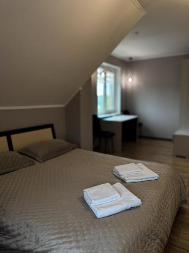 Una cama o camas en una habitación de Laguna