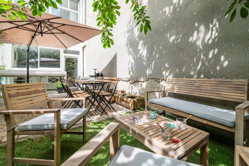 Κήπος έξω από το Loft urbain avec jardin privé en hyper centre