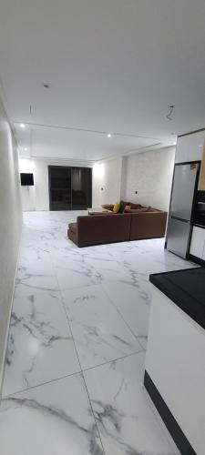 TV a/nebo společenská místnost v ubytování appartment igar azougagh elhoceima