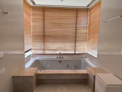 A bathroom at Bright beachfront retreat in Bang Tao