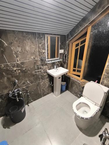Ένα μπάνιο στο Zikra HomeStay