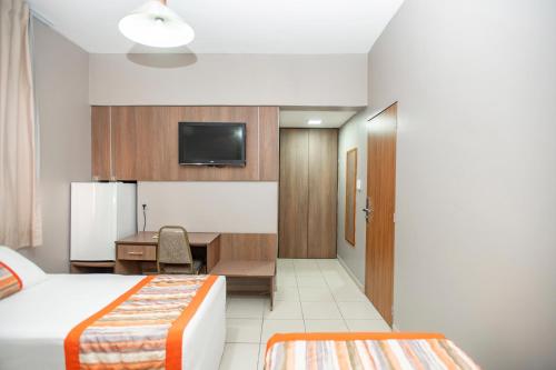 Katil atau katil-katil dalam bilik di Mato Grosso Palace Hotel