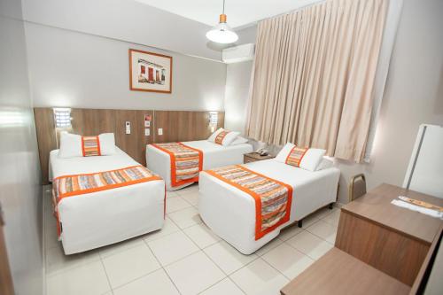 Katil atau katil-katil dalam bilik di Mato Grosso Palace Hotel