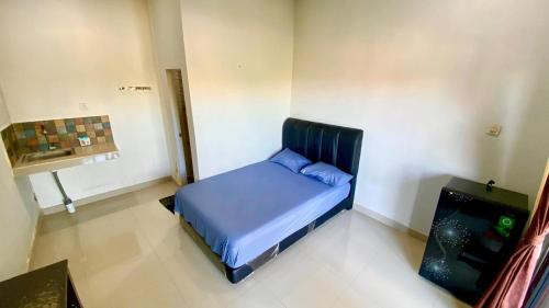 Katil atau katil-katil dalam bilik di Room in Pesanggaran