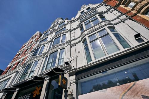 a large building with windows on the side of it at Líbere London Edgware Road in London
