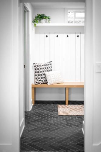 a hallway with a bench in a room at Wayzata Cove in Wayzata