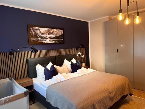 Ένα ή περισσότερα κρεβάτια σε δωμάτιο στο Zentrale Wohnung direkt am Hauptbahnhof - Bismarck