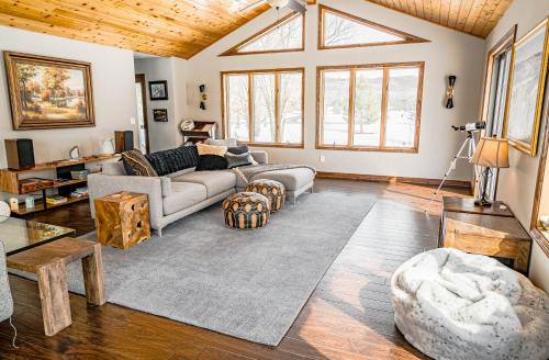a living room with a couch and a table at St. Croix Islands Escape in Somerset
