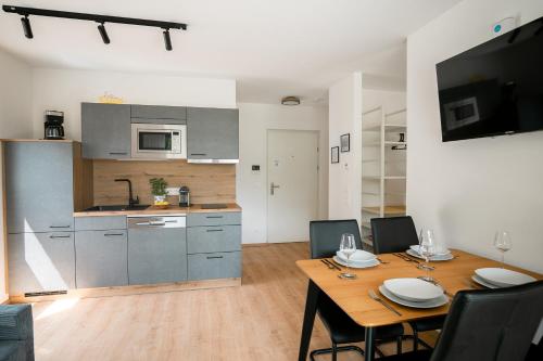 Kuchyň nebo kuchyňský kout v ubytování BLUE LAKE Apartment No12