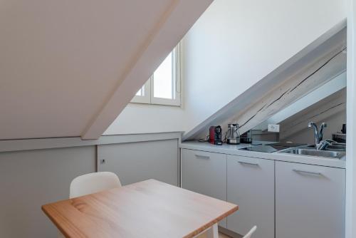 Kuchyň nebo kuchyňský kout v ubytování Suites Beethoven & Vivaldi by Toh Solution