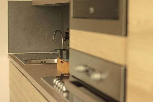Una cocina o cocineta en Da Cichin 1 - Free Parking, Wi-Fi & AC