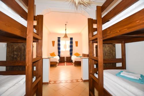 Postel nebo postele na pokoji v ubytování Cli Surf House Morocco