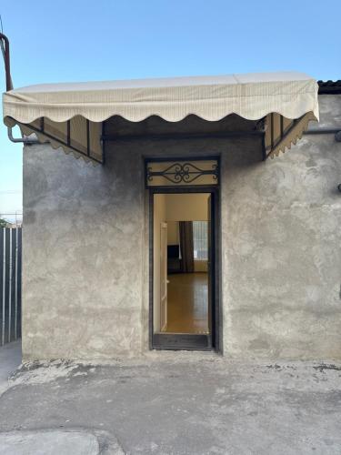 a entrance to a building with a window at Home in Pʼarakʼar