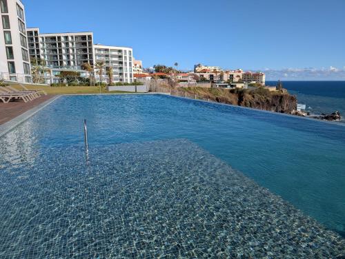 Breathtaking Oceanfront Living, Sunset Facing 3-Bedroom Flat in Acqua Residences