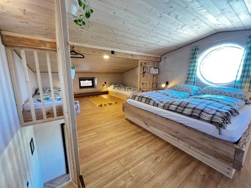 a bedroom with a large bed in a house at Apartmán Stela in Spišské Tomášovce
