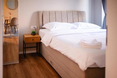 Ένα ή περισσότερα κρεβάτια σε δωμάτιο στο Kaptol 1