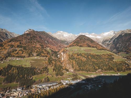 an aerial view of a valley in the mountains at Lahnerhof Chalets in Lutago