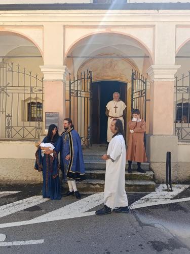 a group of people standing in front of a building at Casa Valletta in Mezzomerico