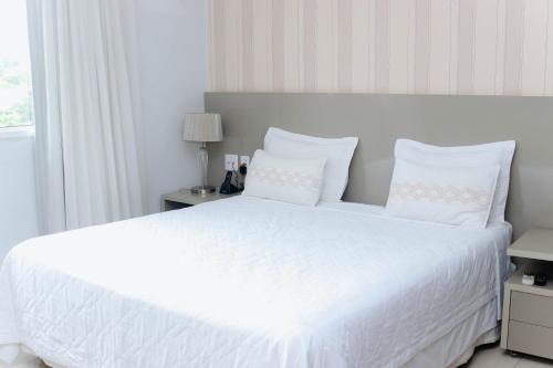 Ένα ή περισσότερα κρεβάτια σε δωμάτιο στο Premier Pallace Hotel