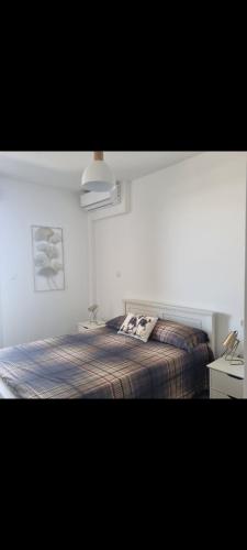 Postel nebo postele na pokoji v ubytování Ti Kaz Vacances T2 vue mer