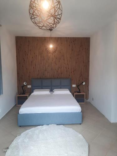 Letto o letti in una camera di Guesthouse Lumo & pool