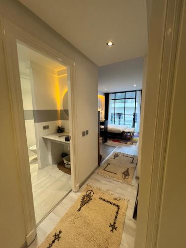 a hallway with a living room with a view of a room at Stay In GAUTHIER studio s in Casablanca