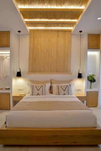 Aktaion Beach Boutique Hotel & Spaにあるベッド
