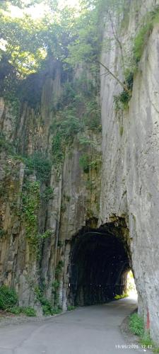 a tunnel in the side of a rocky mountain at Casa Caterina - Riva di Solto - Iseo Lake in Riva di Solto