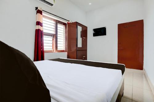 Katil atau katil-katil dalam bilik di Hotel O NRI Guest House
