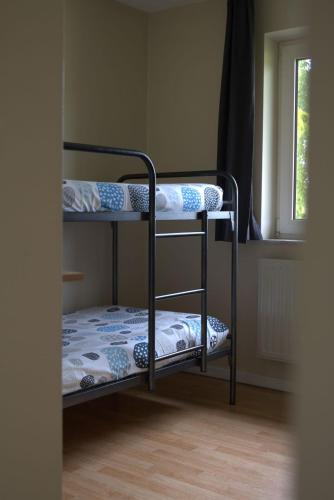 Postel nebo postele na pokoji v ubytování 't Gulpdal Hotel Voeren-Teuven
