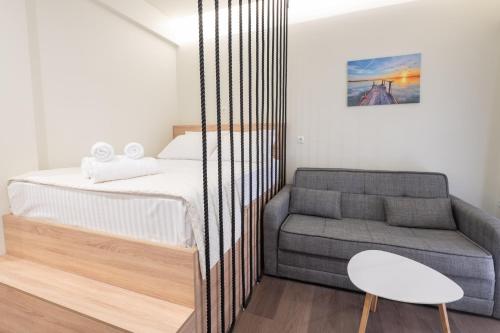 Ένα ή περισσότερα κρεβάτια σε δωμάτιο στο Modern Rooms Exarchia