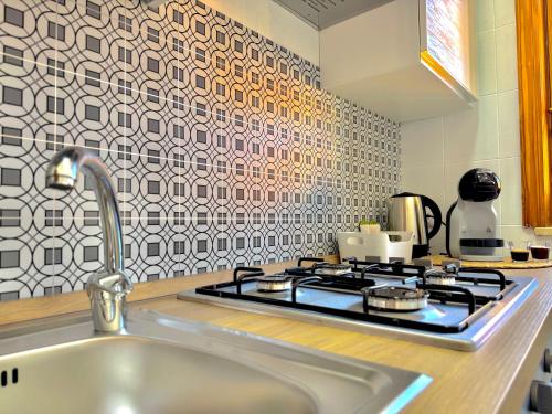 Una cocina o zona de cocina en Mantula Home By JDvacanze