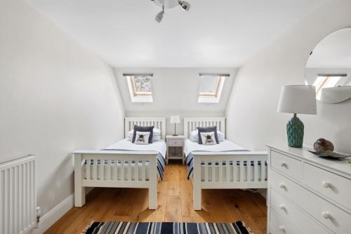 Ένα ή περισσότερα κρεβάτια σε δωμάτιο στο Cosy & Central Brockenhurst Flat, 2BR