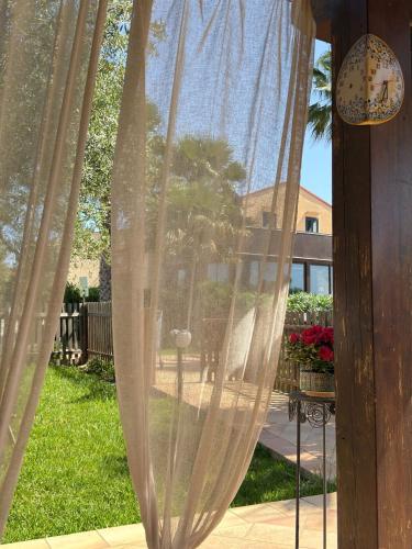 Un jardín fuera de Azienda Agrituristica Baglio Carta