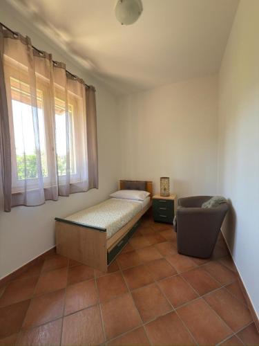 Un lugar para sentarse en Azienda Agrituristica Baglio Carta