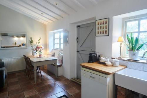 Küche/Küchenzeile in der Unterkunft Cosy Cottage