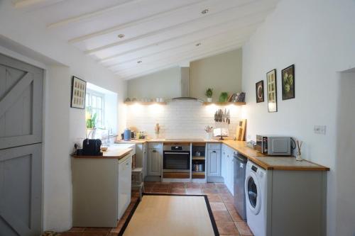 Küche/Küchenzeile in der Unterkunft Cosy Cottage