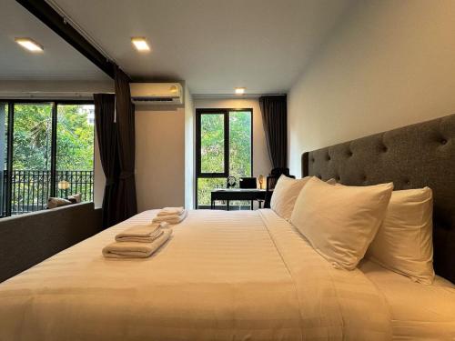 Voodi või voodid majutusasutuse Contemporary Downtown - Ultra Fast WiFi - BTS Asoke toas