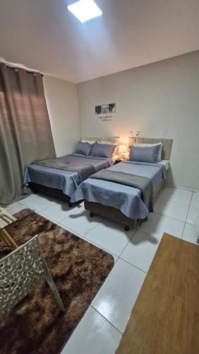 Ένα ή περισσότερα κρεβάτια σε δωμάτιο στο Regency Loft