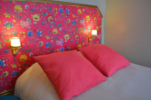 Ein Bett oder Betten in einem Zimmer der Unterkunft Atlantic Hôtel