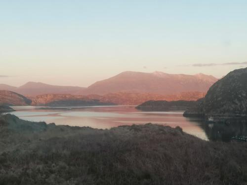 a view of a lake with mountains in the background at The Croft in Whale Islet