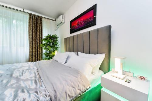 Giường trong phòng chung tại Central Green apartment 3BD - Free Private Parking - by Open House